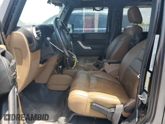 2012 Jeep Wrangler Unlimited Altitude with VIN 1C4HJWEG6CL209870, listed as a Copart auction lot 56490065 with 155,395 mi miles and Clean title. Bid and sale history available at DreamBid. Image 7.