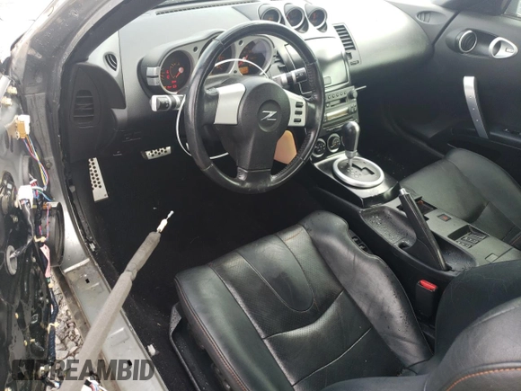 2004 Nissan 350Z Touring with VIN JN1AZ34D24M103656, listed as a Copart auction lot 55100955 with 130,561 mi miles and Salvage title. Bid and sale history available at DreamBid. Image 8.