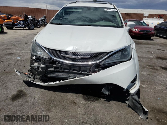 2017 Chrysler Pacifica Touring L Plus with VIN 2C4RC1EGXHR518841, listed as a Copart auction lot 54969455 with 130,902 mi miles and Clean Title. Bid and sale history available at DreamBid. Image 5.