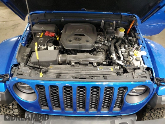 2022 Jeep Wrangler Unlimited Rubicon with VIN 1C4JJXR69NW190564, listed as a Copart auction lot 83703504 with 16,803 mi miles and Salvage title. Bid and sale history available at DreamBid. Image 12.