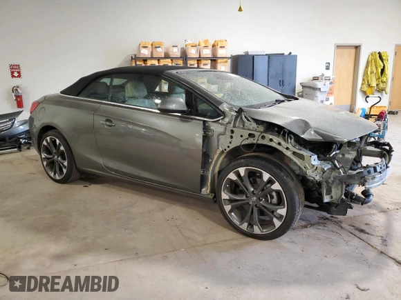 2017 Buick Cascada Premium с VIN W04WH3N59HG117999, выставлен на аукционе Copart как лот 71565694 с пробегом 62 142 миль миль и Списание • Salvage title. История ставок и продаж доступна на DreamBid. Изображение 4.