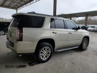 2015 GMC Yukon SLE with VIN 1GKS1AKC5FR120713, listed as a Copart auction lot 48009325 with 133,372 mi miles and Salvage Title. Bid and sale history available at carsss.com. Image 3.