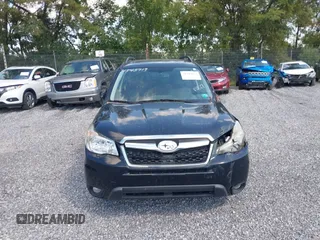 2014 Subaru Forester 2.5i Limited with VIN JF2SJAJC9EH517196, listed as a IAAI auction lot 31343919 with 71,396 mi miles. Bid and sale history available at carsss.com. Image 12.