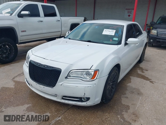 2013 Chrysler 300 with VIN 2C3CCAAG9DH588198, listed as a IAAI auction lot 42556294 with 171,765 mi miles and . Bid and sale history available at DreamBid. Image 6.