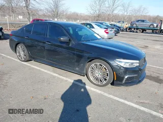 2018 BMW 5 Series M550i xDrive with VIN WBAJB9C55JB049529, listed as a IAAI auction lot 41241917 with 116,265 mi miles and . Bid and sale history available at carsss.com. Image 1.