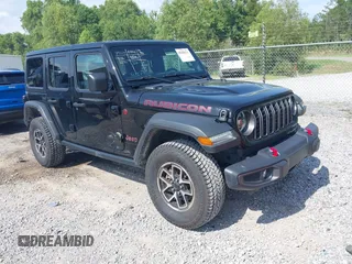 2024 Jeep Wrangler Rubicon with VIN 1C4PJXFG2RW253100, listed as a IAAI auction lot 42608331 with 39,844 mi miles and . Bid and sale history available at DreamBid. Image 1.