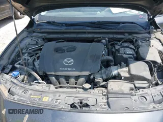 2021 Mazda 3 Preferred with VIN JM1BPACL1M1317639, listed as a IAAI auction lot 41939340 with 51,195 mi miles and . Bid and sale history available at DreamBid. Image 10.