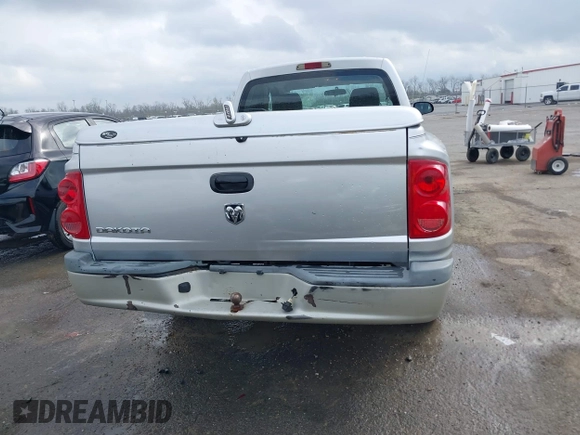 2005 Dodge Dakota ST with VIN 1D7HE22K25S119460, listed as a IAAI auction lot 41790592 with 104,995 mi miles and . Bid and sale history available at DreamBid. Image 16.