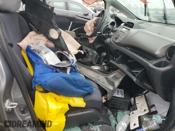 2010 Honda Fit Sport with VIN JHMGE8H40AC017384, listed as a Copart auction lot 58226445 with 138,453 mi miles and Salvage title. Bid and sale history available at DreamBid. Image 7.