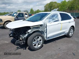 2020 Ford Edge SEL z VIN 2FMPK4J95LBA31157, wystawiony jako IAAI lot #42225863 z przebiegiem 96 082 mil mil oraz . Historia ofert i sprzedaży dostępna na DreamBid. Obrazek 2.