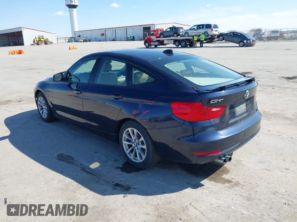 2014 BMW 3 Series 328i Gran Turismo xDrive with VIN WBA3X5C51ED557333, listed as a IAAI auction lot 41879900 with 101,737 mi miles and . Bid and sale history available at DreamBid. Image 3.