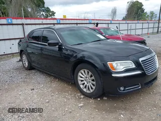 2013 Chrysler 300 with VIN 2C3CCAAG8DH515050, listed as a IAAI auction lot 41905134 with 137,837 mi miles. Bid and sale history available at carsss.com. Image 1.