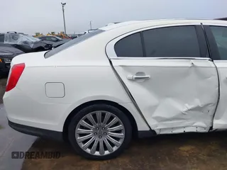 2013 Lincoln MKS with VIN 1LNHL9DK4DG605058, listed as a IAAI auction lot 41068489 with 101,801 mi miles. Bid and sale history available at carsss.com. Image 19.