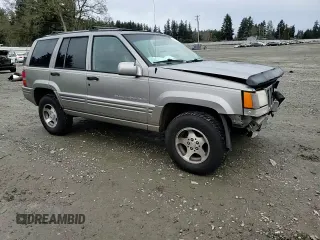 1997 Jeep Grand Cherokee Limited with VIN 1J4GZ78Y4VC693193, listed as a Copart auction lot 46327885 with 235,553 mi miles and Salvage Title. Bid and sale history available at carsss.com. Image 11.