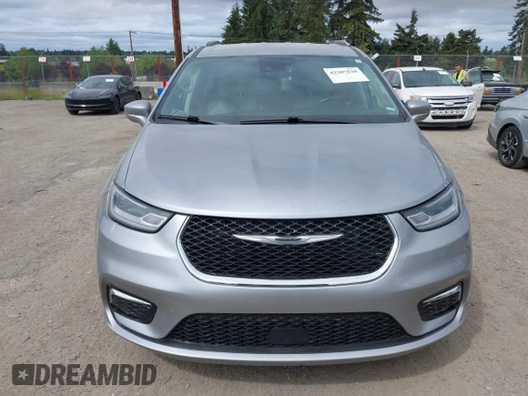 2021 Chrysler Pacifica Touring L with VIN 2C4RC1BG3MR552828, listed as a IAAI auction lot 42207838 with 67,917 mi miles and . Bid and sale history available at DreamBid. Image 12.