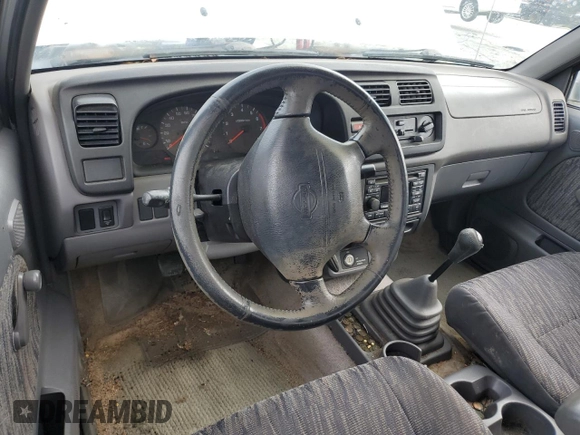 2000 Nissan Frontier XE with VIN 1N6ED26T0YC314102, listed as a Copart auction lot 83678264 with 174,419 mi miles and Salvage title. Bid and sale history available at DreamBid. Image 8.