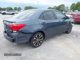 2018 Toyota Corolla L with VIN 5YFBURHE1JP814781, listed as a IAAI auction lot 42408378 with 115,543 mi miles and . Bid and sale history available at DreamBid. Image 4.