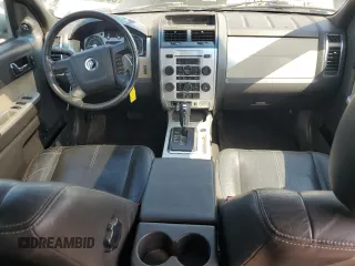 2009 Mercury Mariner Premier z VIN 4M2CU87769KJ11358, wystawiony jako Copart lot #55577235 z przebiegiem 206 627 mil mil oraz Szkody całkowita. Historia ofert i sprzedaży dostępna na DreamBid. Obrazek 8.