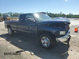 2002 Dodge Ram 2500 with VIN 3B7KC236X2M268324, listed as a Copart auction lot 57196344 with 179,647 mi miles and Salvage Title. Bid and sale history available at carsss.com. Image 4.