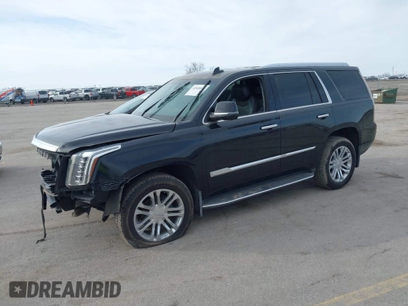 2016 Cadillac Escalade z VIN 1GYS4AKJ5GR411967, wystawiony jako IAAI lot #41848021 z przebiegiem 120 579 mil mil oraz . Historia ofert i sprzedaży dostępna na DreamBid. Obrazek 2.