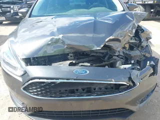 2018 Ford Focus SE with VIN 1FADP3F26JL249433, listed as a IAAI auction lot 41871395 with 131,357 mi miles. Bid and sale history available at carsss.com. Image 6.