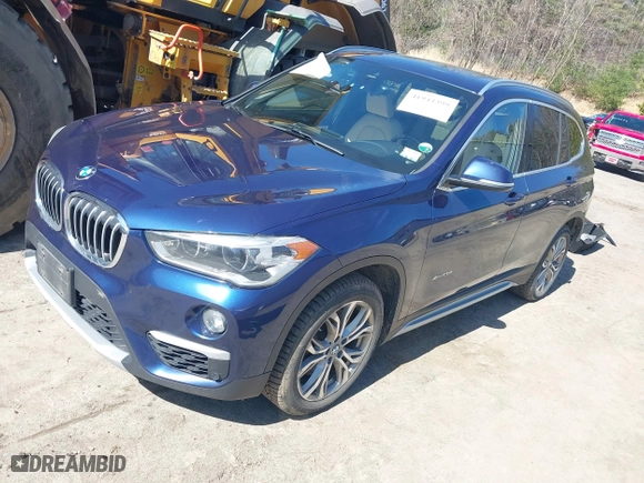 2017 BMW X1 xDrive28i with VIN WBXHT3C33H5F82035, listed as a IAAI auction lot 41944399 with 102,942 mi miles. Bid and sale history available at carsss.com. Image 17.