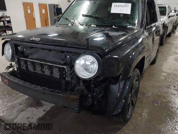 2014 Jeep Patriot Latitude with VIN 1C4NJPFB4ED645447, listed as a IAAI auction lot 41851597 with 128,319 mi miles and . Bid and sale history available at carsss.com. Image 6.