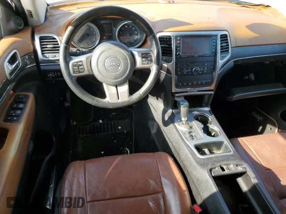 2013 Jeep Grand Cherokee Overland with VIN 1C4RJECT8DC556536, listed as a Copart auction lot 52758795 with 67,123 mi miles and Salvage Title. Bid and sale history available at carsss.com. Image 8.