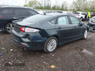 2015 Ford Fusion SE Hybrid with VIN 3FA6P0LU9FR184907, listed as a IAAI auction lot 42119737 with 153,255 mi miles and . Bid and sale history available at DreamBid. Image 4.