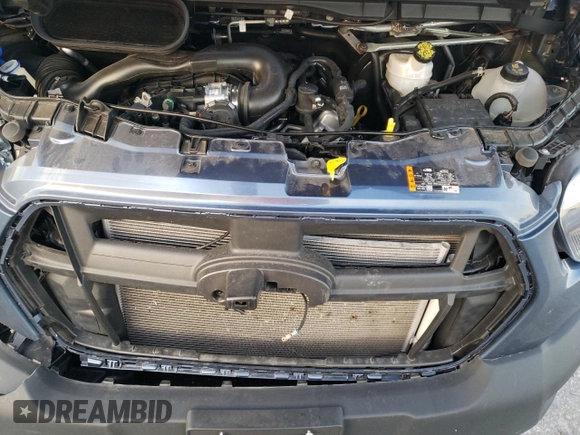 2024 Ford Transit Cargo with VIN 1FTBR1C85RKA59326, listed as a Copart auction lot 76836954 with 22,755 mi miles and Salvage Title. Bid and sale history available at DreamBid. Image 12.