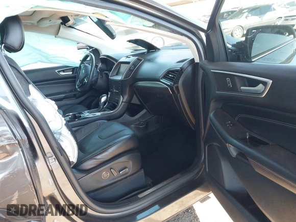 2015 Ford Edge Titanium z VIN 2FMTK3K90FBC12582, wystawiony jako IAAI lot #41860973 z przebiegiem Nie podano mil oraz . Historia ofert i sprzedaży dostępna na DreamBid. Obrazek 5.