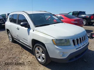 2012 Jeep Compass Sport with VIN 1C4NJCBA1CD660068, listed as a IAAI auction lot 41766146 with 173,445 mi miles. Bid and sale history available at carsss.com. Image 1.