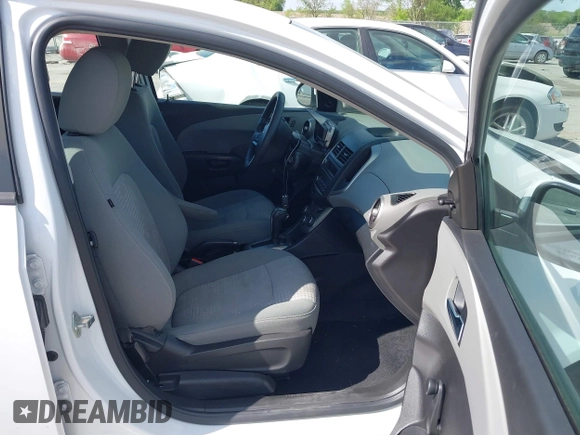 2014 Chevrolet Sonic LS with VIN 1G1JA6SH5E4171729, listed as a IAAI auction lot 42271221 with 58,117 mi miles and . Bid and sale history available at DreamBid. Image 5.