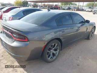 2015 Dodge Charger SXT with VIN 2C3CDXHG4FH890684, listed as a IAAI auction lot 41896958 with 118,140 mi miles and . Bid and sale history available at DreamBid. Image 4.