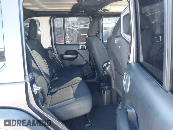 2018 Jeep Wrangler Unlimited Sport S z VIN 1C4HJXDG4JW132547, wystawiony jako IAAI lot #41838010 z przebiegiem 69 987 mil mil oraz . Historia ofert i sprzedaży dostępna na DreamBid. Obrazek 8.