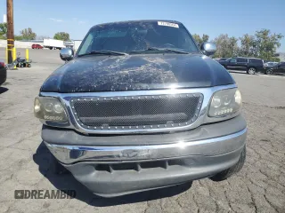 2000 Ford F-150 XL with VIN 1FTRX17W7YKB44552, listed as a Copart auction lot 72790504 with 0 mi miles and Salvage Title. Bid and sale history available at carsss.com. Image 5.