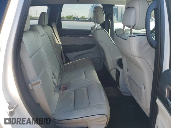 2017 Jeep Grand Cherokee Summit with VIN 1C4RJFJT9HC736624, listed as a Copart auction lot 62197245 with 217,469 mi miles and Salvage title. Bid and sale history available at DreamBid. Image 10.
