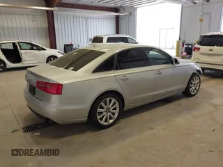 2015 Audi A6 Premium z VIN WAUFFAFC3FN021983, wystawiony jako IAAI lot #42105719 z przebiegiem 104 143 mil mil oraz . Historia ofert i sprzedaży dostępna na DreamBid. Obrazek 4.