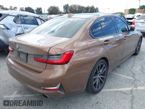 2019 BMW 3 Series 330i with VIN WBA5R1C57KAK07519, listed as a IAAI auction lot 42042379 with 40,898 mi miles and . Bid and sale history available at DreamBid. Image 4.