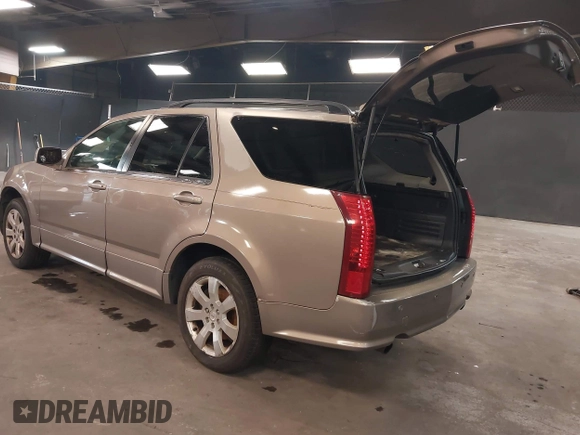 2007 Cadillac SRX with VIN 1GYEE637370137893, listed as a IAAI auction lot 41869395 with 215,460 mi miles. Bid and sale history available at carsss.com. Image 3.