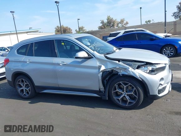 2019 BMW X1 xDrive28i with VIN WBXHT3C56K5L38658, listed as a IAAI auction lot 42496734 with 49,373 mi miles and . Bid and sale history available at DreamBid. Image 13.