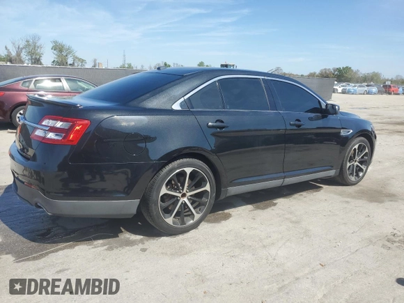 2015 Ford Taurus SEL with VIN 1FAHP2E87FG208522, listed as a Copart auction lot 46700095 with 97,439 mi miles and Salvage title. Bid and sale history available at DreamBid. Image 3.