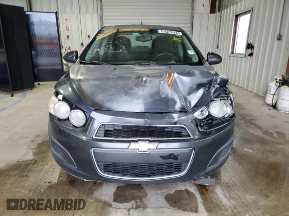2014 Chevrolet Sonic LT z VIN 1G1JC5SH1E4118997, wystawiony jako Copart lot #70792334 z przebiegiem 166 691 mil mil oraz Szkoda całkowita • Salvage title. Historia ofert i sprzedaży dostępna na DreamBid. Obrazek 5.