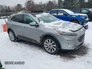 2021 Ford Escape Titanium Hybrid with VIN 1FMCU9DZXMUA01732, listed as a IAAI auction lot 41191436 with 41,116 mi miles and . Bid and sale history available at DreamBid. Image 1.