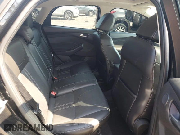 2014 Ford Focus Titanium with VIN 1FADP3N27EL251229, listed as a Copart auction lot 62201195 with 75,534 mi miles and Salvage title. Bid and sale history available at DreamBid. Image 10.
