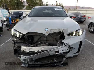 2024 BMW X6 xDrive40i with VIN 5UX33EX04R9T50214, listed as a Copart auction lot 85332204 with 8,710 mi miles and Salvage Title. Bid and sale history available at carsss.com. Image 5.