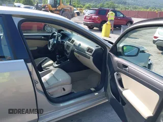 2014 Volkswagen Jetta TDI w/Premium with VIN 3VW3L7AJ3EM319365, listed as a IAAI auction lot 42479875 with 133,068 mi miles and . Bid and sale history available at DreamBid. Image 5.