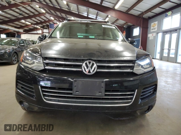 2012 Volkswagen Touareg Sport with VIN WVGEF9BP9CD011879, listed as a Copart auction lot 56903035 with 198,262 mi miles and Clean title. Bid and sale history available at DreamBid. Image 5.