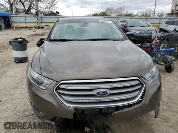 2015 Ford Taurus SE с VIN 1FAHP2D83FG159160, выставлен на аукционе Copart как лот 50523745 с пробегом Не указан миль и Списание • Salvage title. История ставок и продаж доступна на DreamBid. Изображение 5.