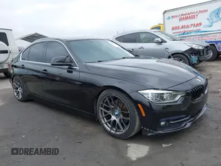 2018 BMW 3 Series 330i xDrive with VIN WBA8D9G57JNU67415, listed as a IAAI auction lot 41513343 with 98,714 mi miles. Bid and sale history available at carsss.com. Image 1.